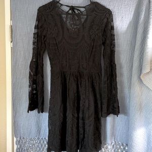 Very unique black juniors dress NWT